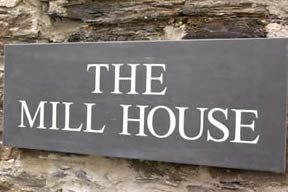 The Mill House sign